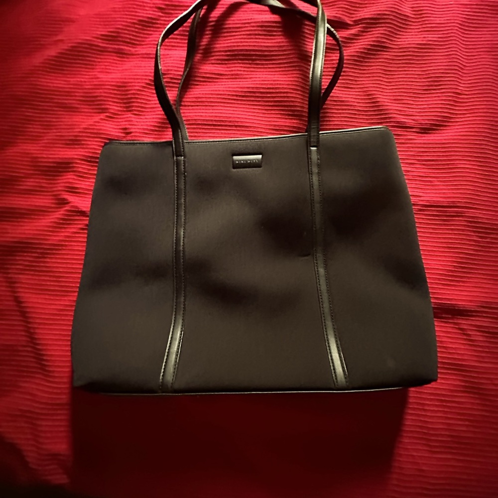 Nine West cloth with leather details and trim purse.